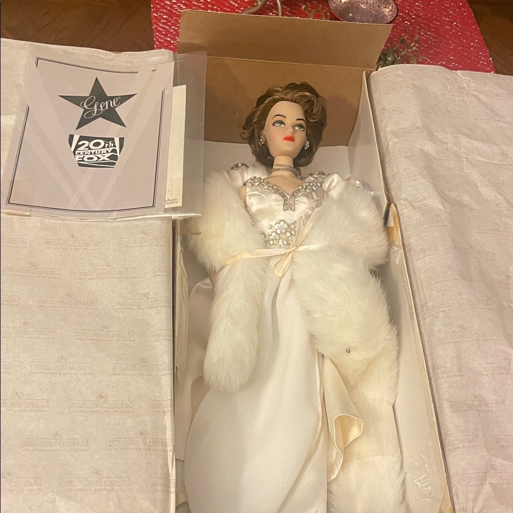 Elegant White Doll with Jewel Accents